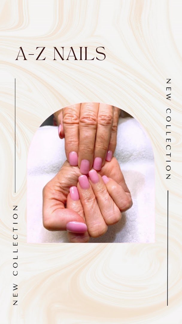 Manicurist paints nails with gel polish.